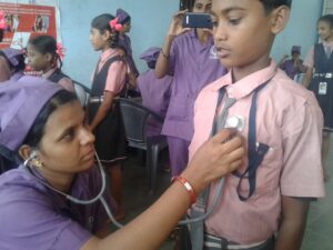 SSVS youth volunteers engaged in basic health check-up activity