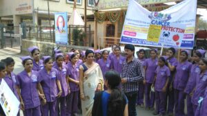 Students promoting cancer awareness in public gathering